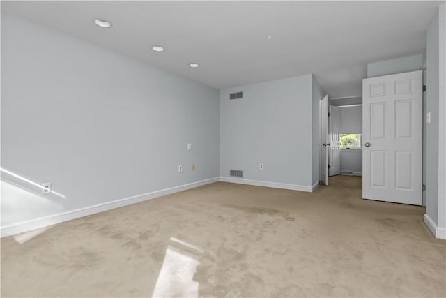 unfurnished bedroom with light carpet