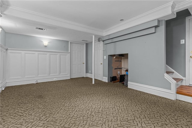 basement with crown molding and carpet flooring