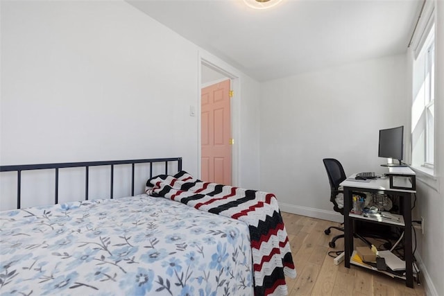 bedroom featuring light hardwood / wood-style floors