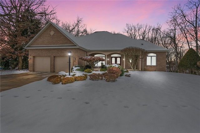 view of front of home with a garage