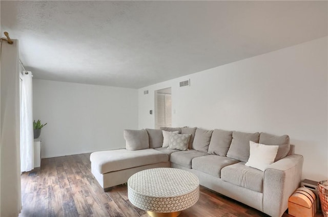 living room with hardwood / wood-style flooring