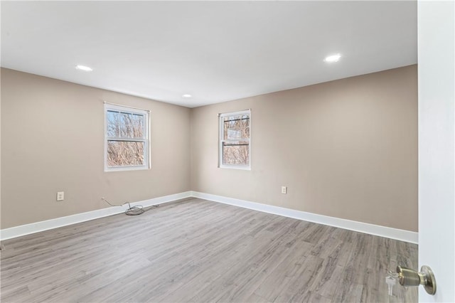 empty room featuring light hardwood / wood-style floors