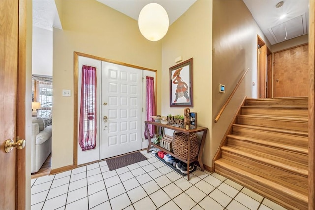 foyer with light tile patterned flooring