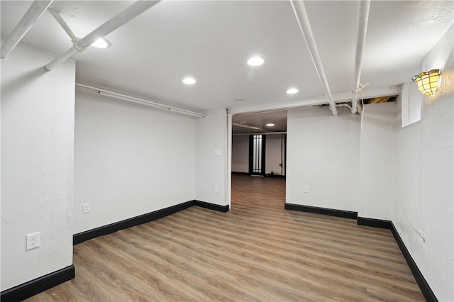 basement with wood-type flooring