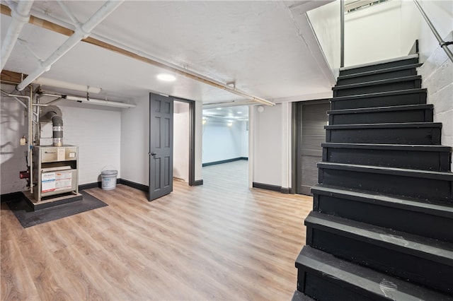 basement with light wood-type flooring