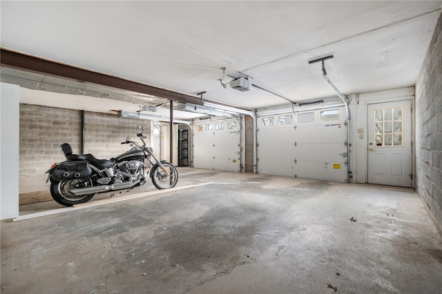 garage featuring a garage door opener