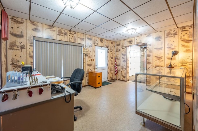 home office with a paneled ceiling