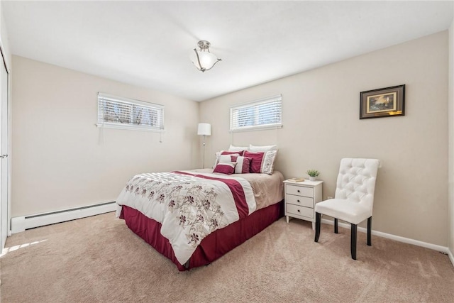 carpeted bedroom with baseboard heating