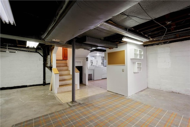 basement featuring washer and clothes dryer