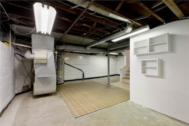 basement featuring heating unit and gas water heater