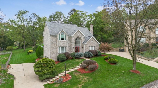 view of property with a front lawn