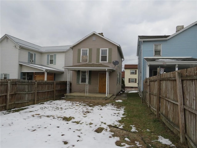 view of snow covered property