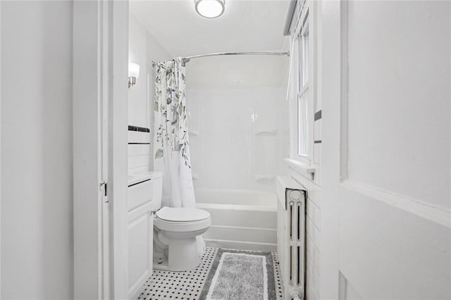 bathroom featuring shower / bathtub combination with curtain, tile patterned floors, toilet, and radiator heating unit