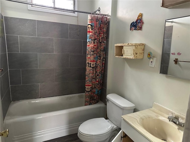 full bathroom with vanity, toilet, and shower / tub combo