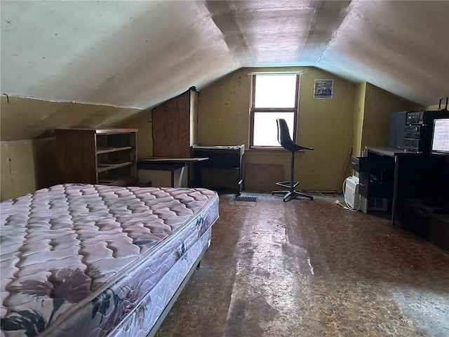 bedroom featuring vaulted ceiling