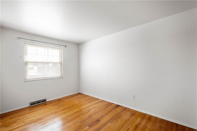 empty room featuring light wood-type flooring