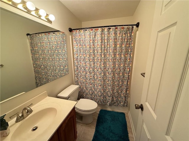 full bathroom featuring vanity, shower / bath combination with curtain, and toilet