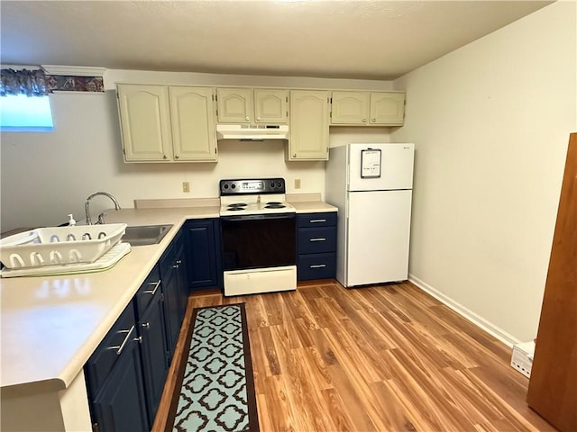 kitchen with electric stove, white cabinetry, sink, white refrigerator, and light hardwood / wood-style flooring