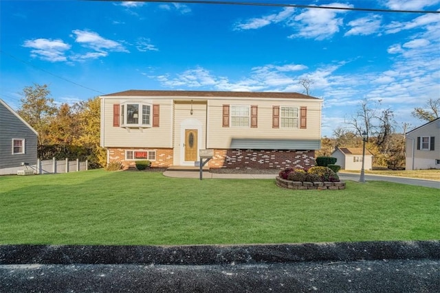 bi-level home featuring a front yard