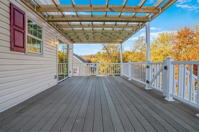 wooden deck featuring a pergola