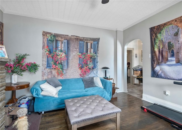 living room with dark hardwood / wood-style flooring and crown molding