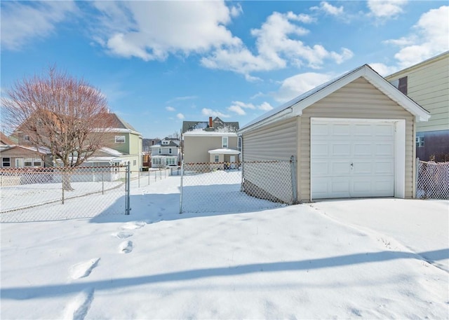 view of snow covered garage