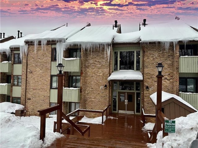 view of snow covered property