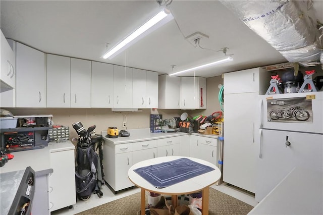 kitchen with white cabinetry