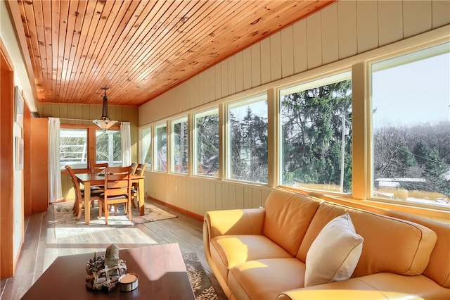 sunroom with wood ceiling