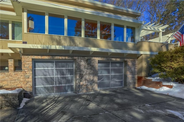 view of property exterior with a garage