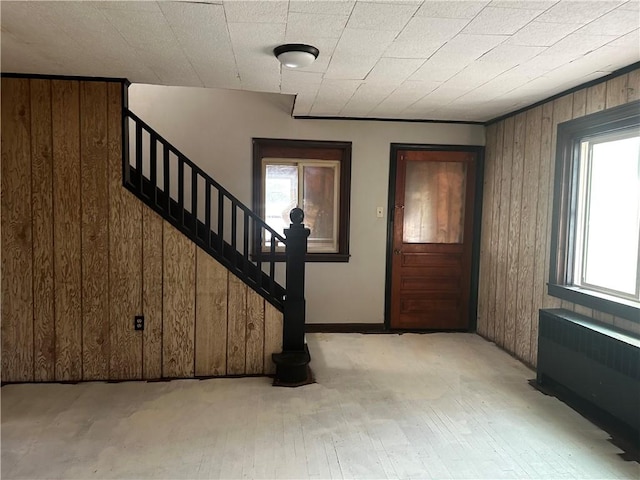 entryway featuring radiator and light wood-type flooring