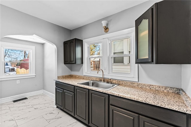 kitchen with a healthy amount of sunlight and sink