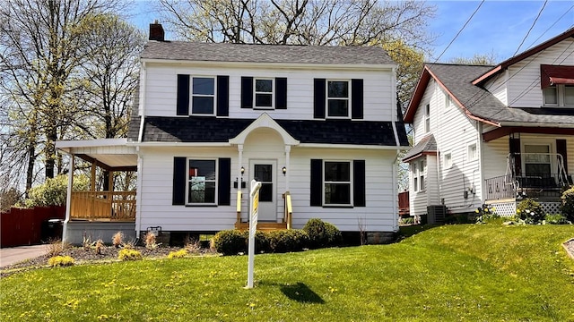 380 Spencer Ave, Sharon, PA 16146 - view of front facade with a front lawn, a chimney, covered porch, and roof with shingles