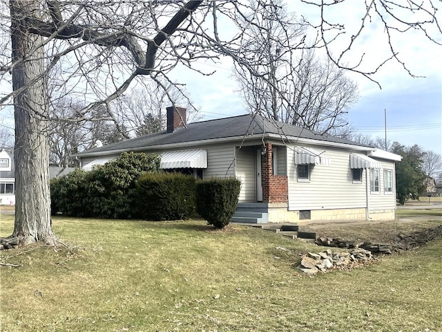 view of front of home with a front yard