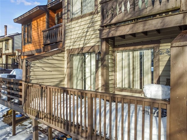 view of snow covered deck