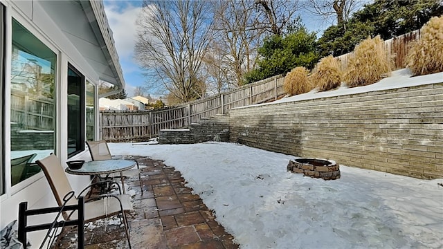 exterior space featuring an outdoor fire pit