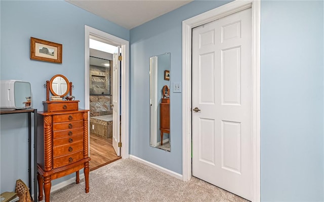 interior space featuring light colored carpet