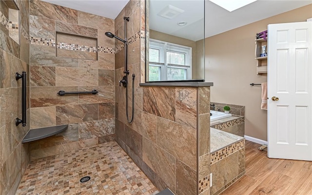 bathroom with separate shower and tub and hardwood / wood-style floors