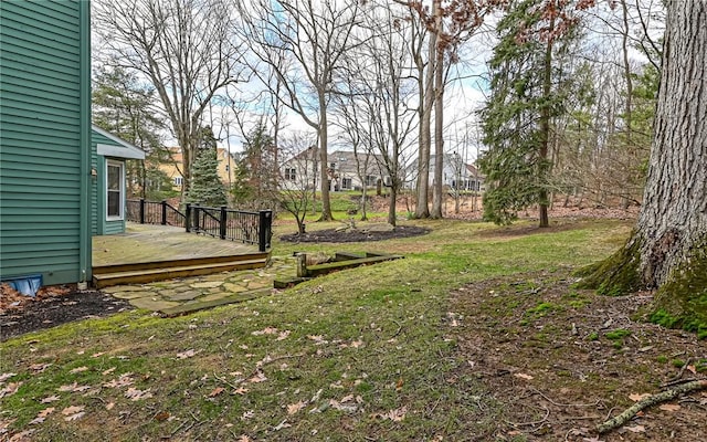 view of yard featuring a wooden deck