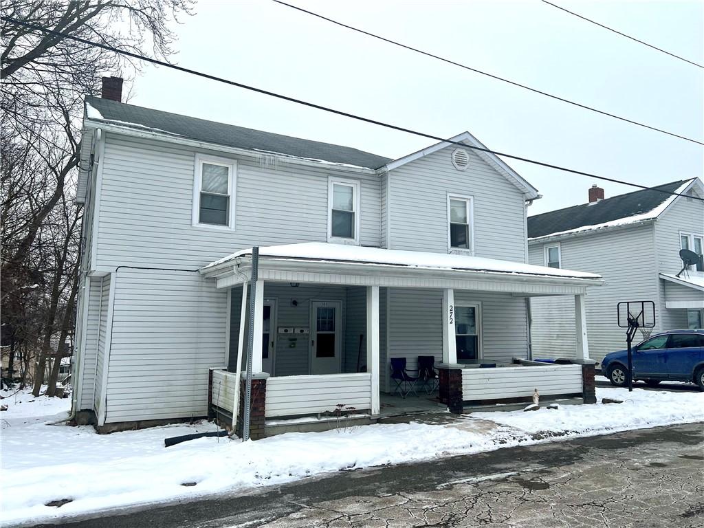 front facade featuring covered porch