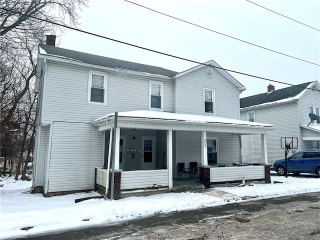 front facade featuring covered porch