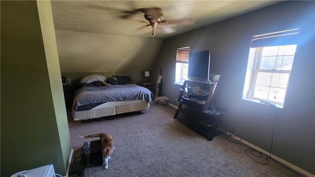 carpeted bedroom with lofted ceiling and ceiling fan