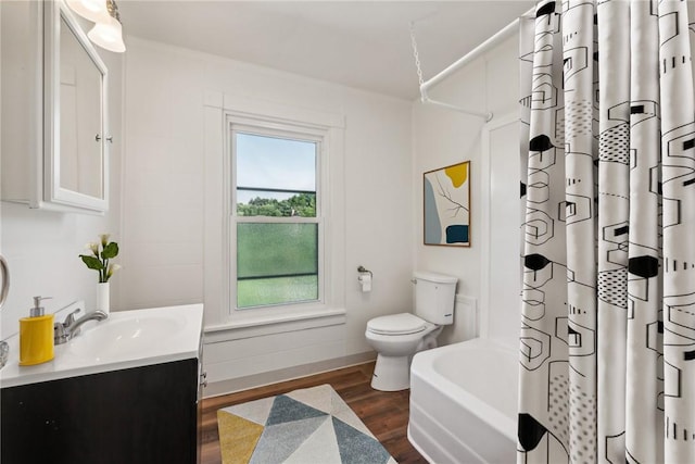 full bathroom featuring shower / bath combination with curtain, vanity, toilet, and hardwood / wood-style flooring