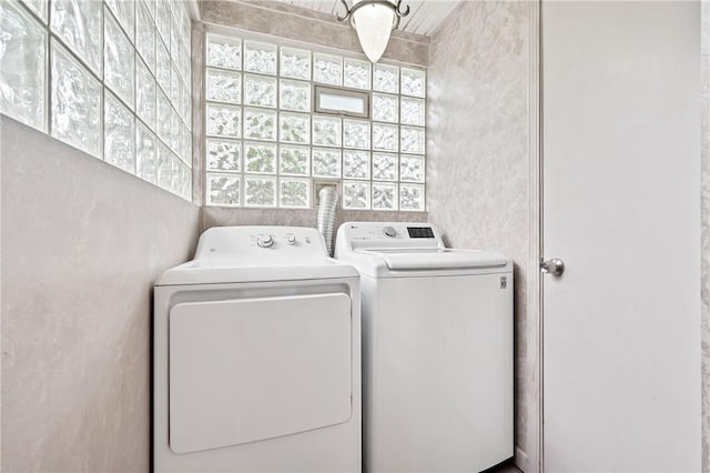 laundry room with washer and clothes dryer