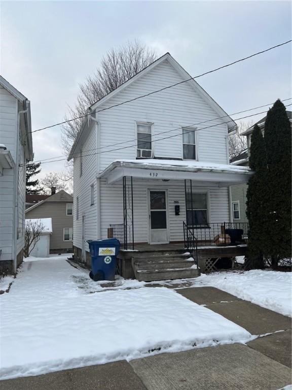 front facade with a porch