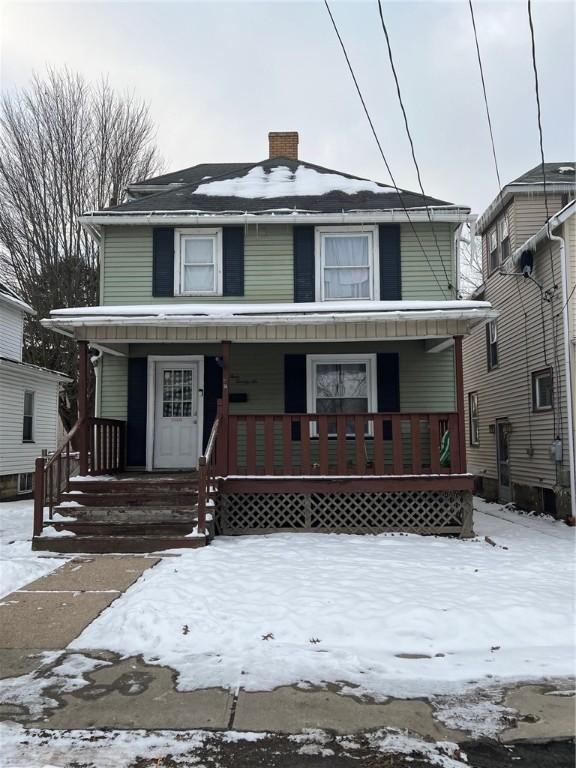 view of front property with covered porch