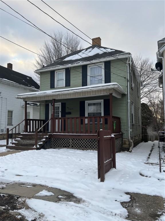 view of front of house featuring covered porch