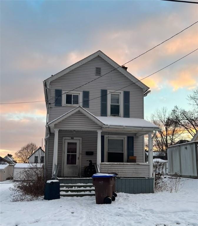 view of property with covered porch