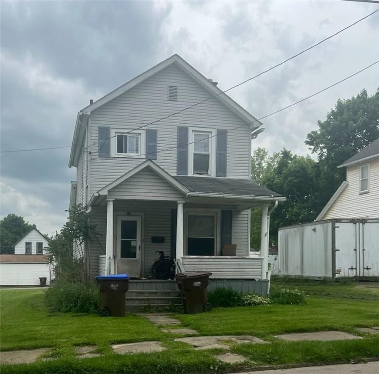 515 Davis St, Sharon, PA 16146 - view of front facade featuring covered porch and a front lawn