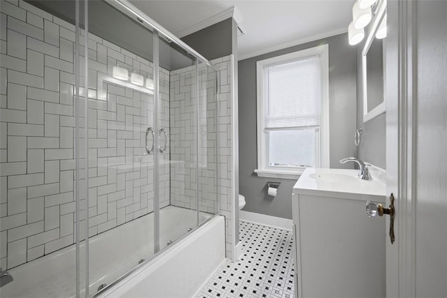 full bath with baseboards, toilet, tile patterned flooring, crown molding, and vanity